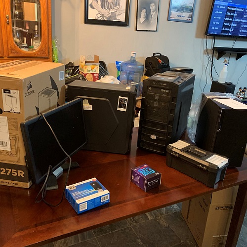 Components on desk with a monitor for testing